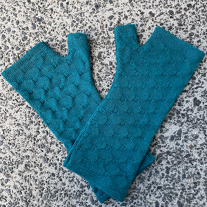 Lovely teal coloured fingerless gloves in a cross textured pattern.